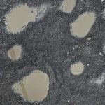 The Reflective Lens of Potholes: Examining Government Priorities from Kerala to New York