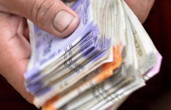 Indian Rupee Hits Record Low of 96.9 Against US Dollar Amidst Global Economic Turmoil