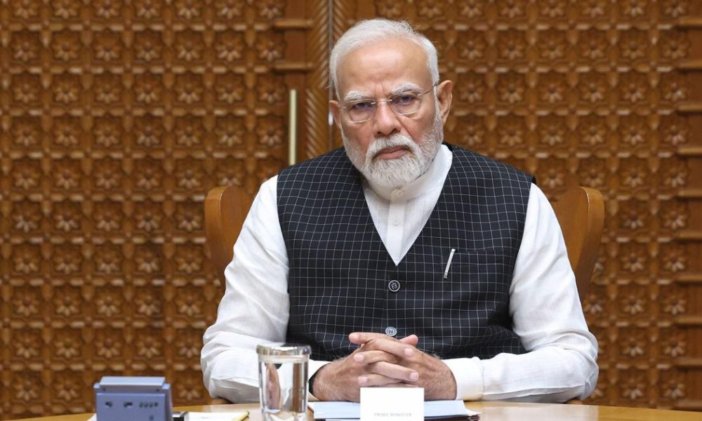PM Modi Dismisses Claims of Proposed Tax on Foreign Travel Amid Economic Challenges