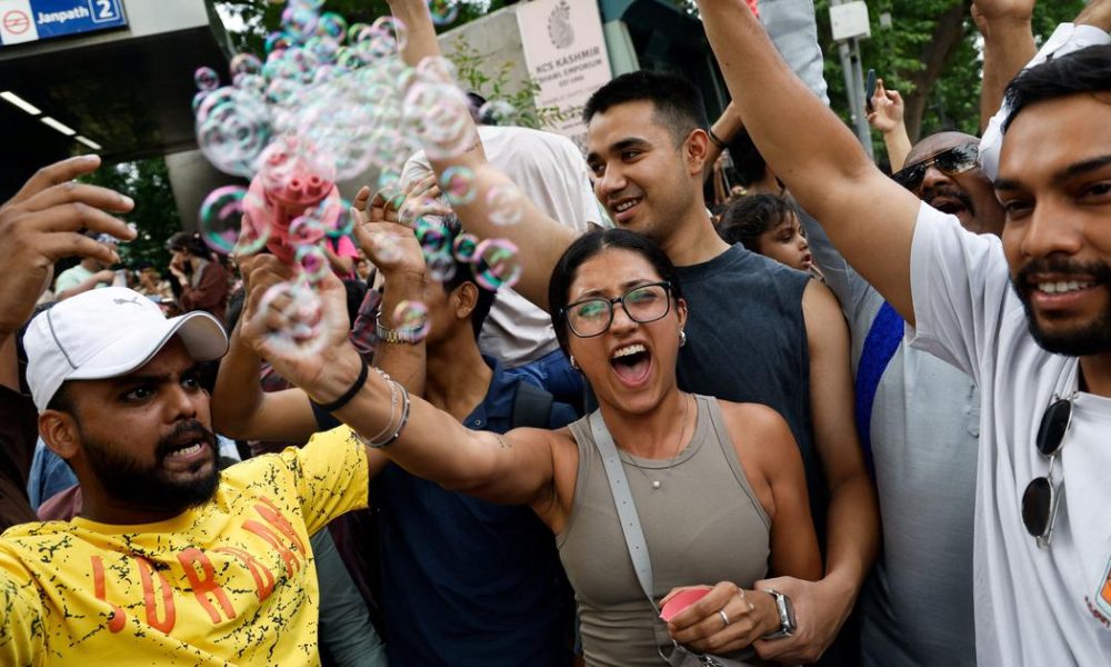 Celebration Erupts at Jantar Mantar Following Dharmendra Pradhan's Resignation