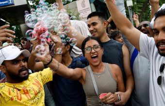 Celebration Erupts at Jantar Mantar Following Dharmendra Pradhan's Resignation